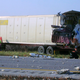 A crash caused by the truck driver falling asleep.